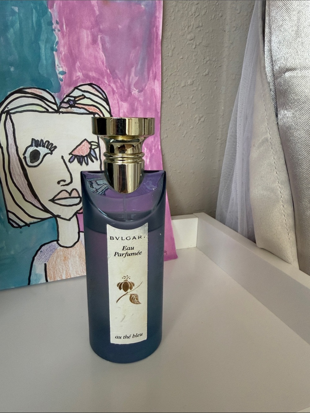 Bvlgary blue glass perfume bottle with gold cap